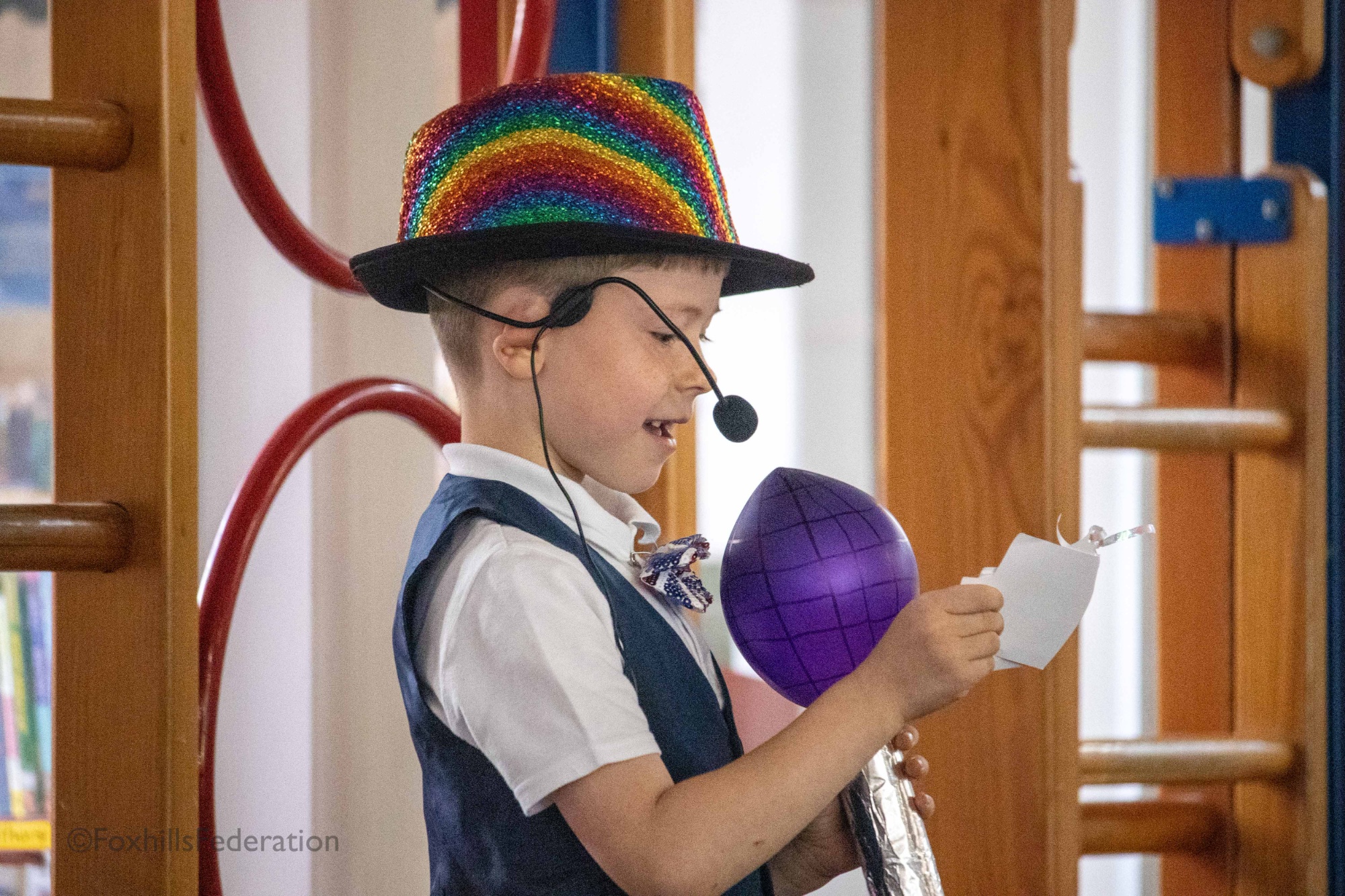A boy tells jokes at Foxhills Got Talent