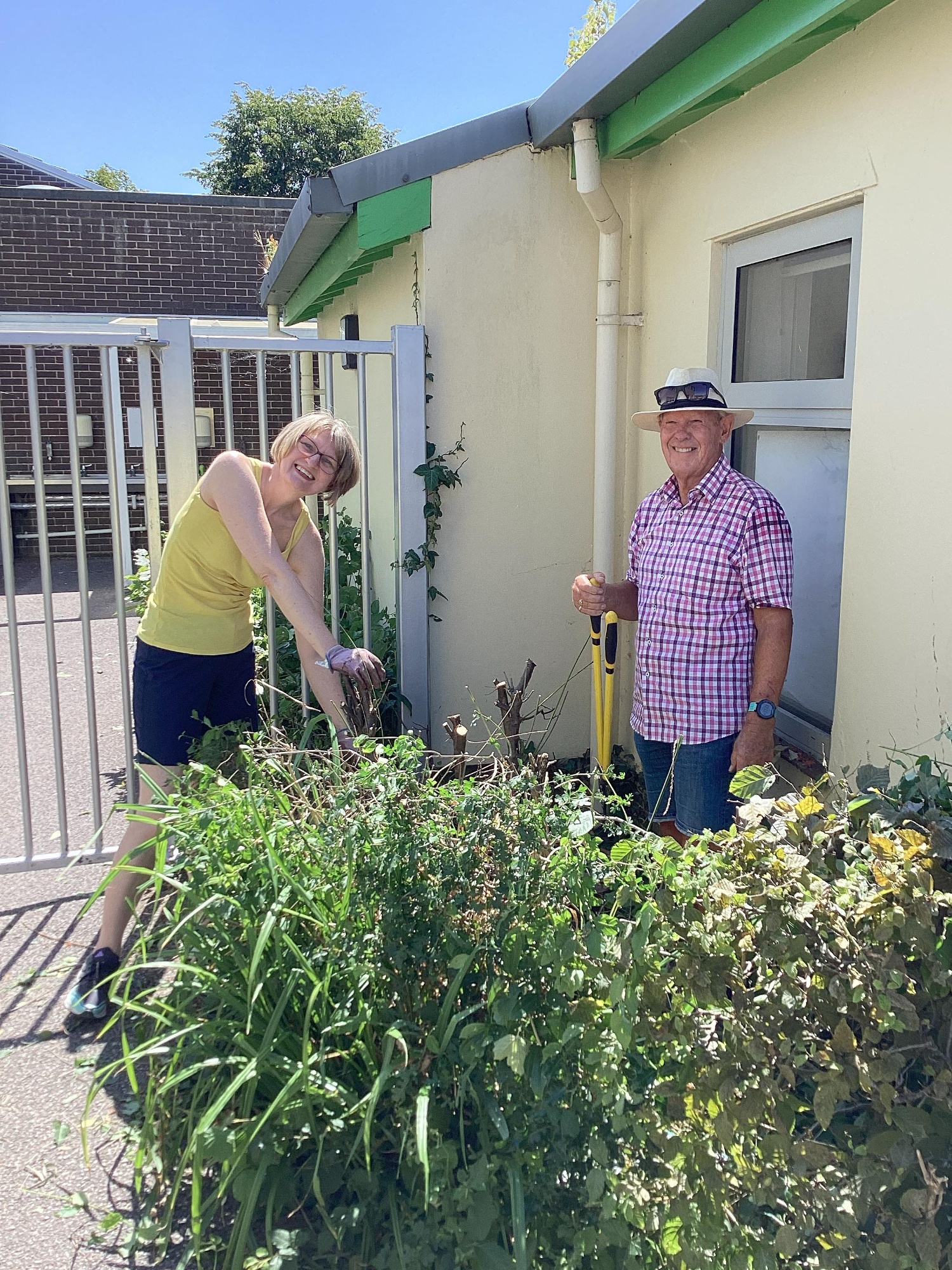 Mrs Kealey helps out with the garden