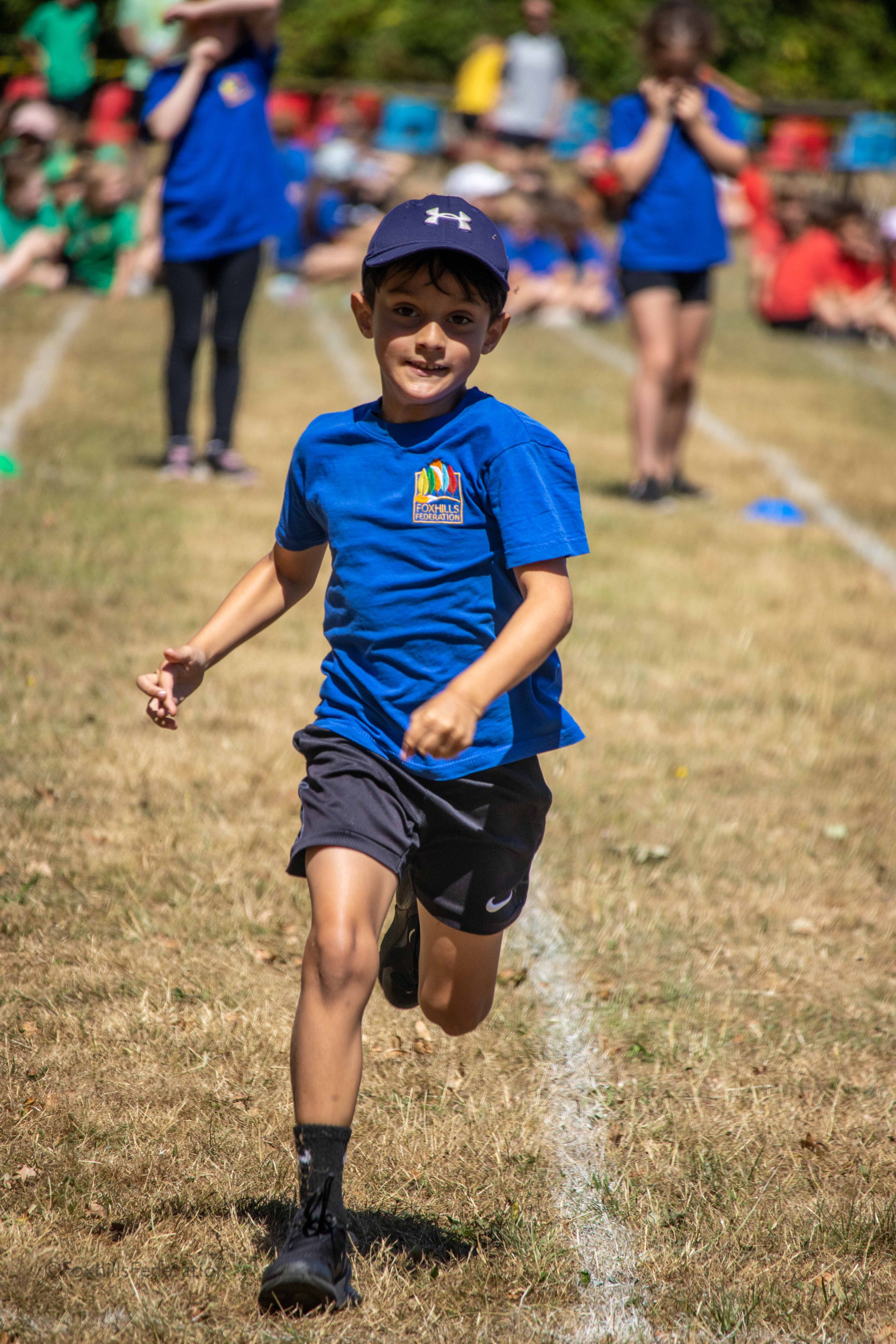 Children run a running race