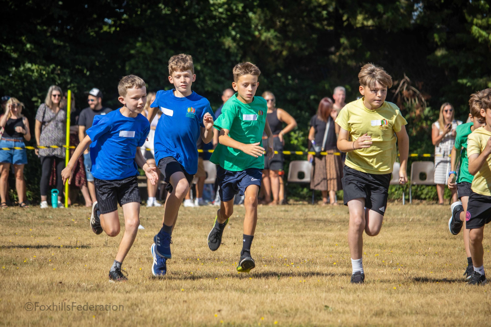 Children run a running race