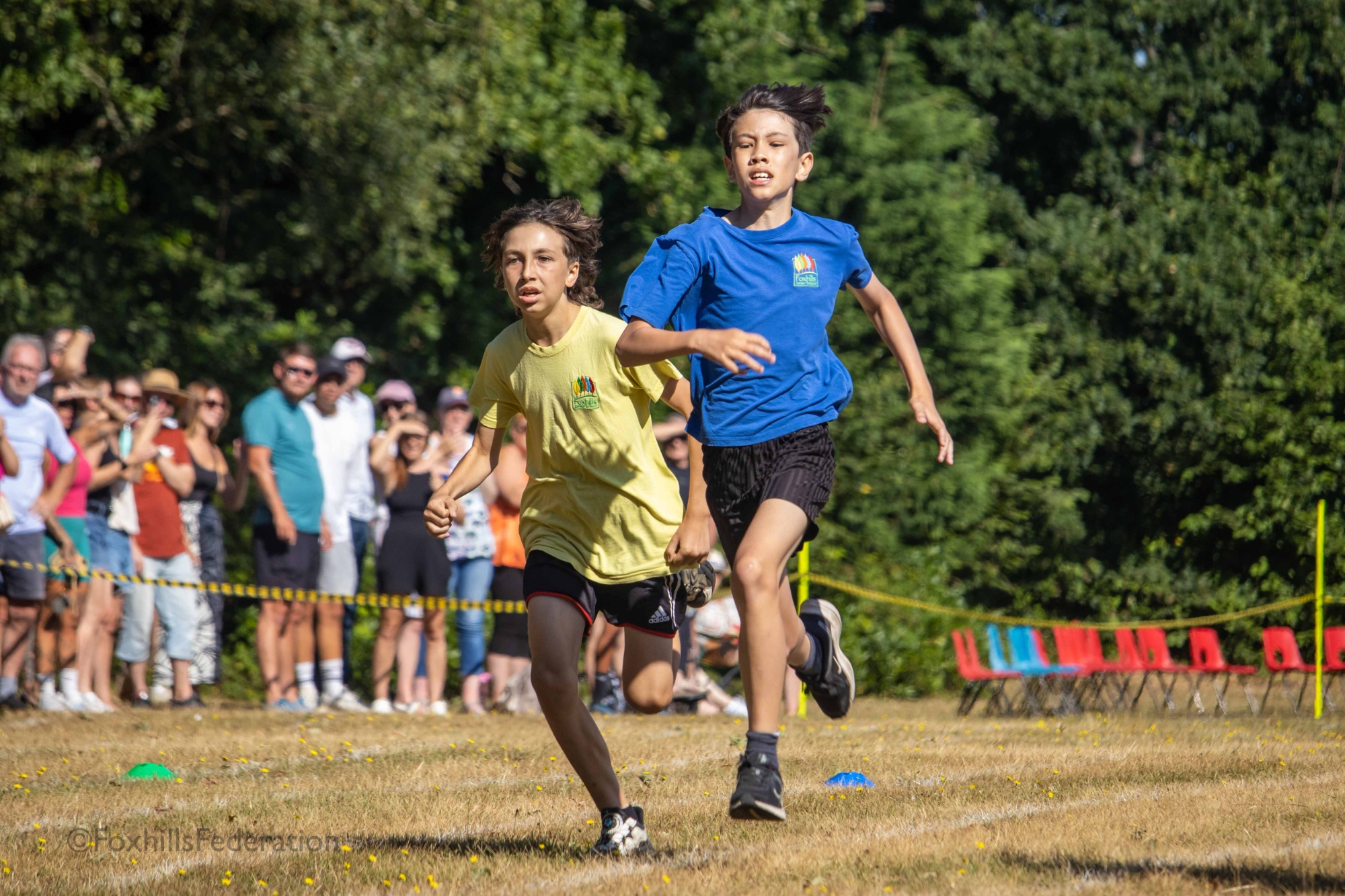 Children run a running race