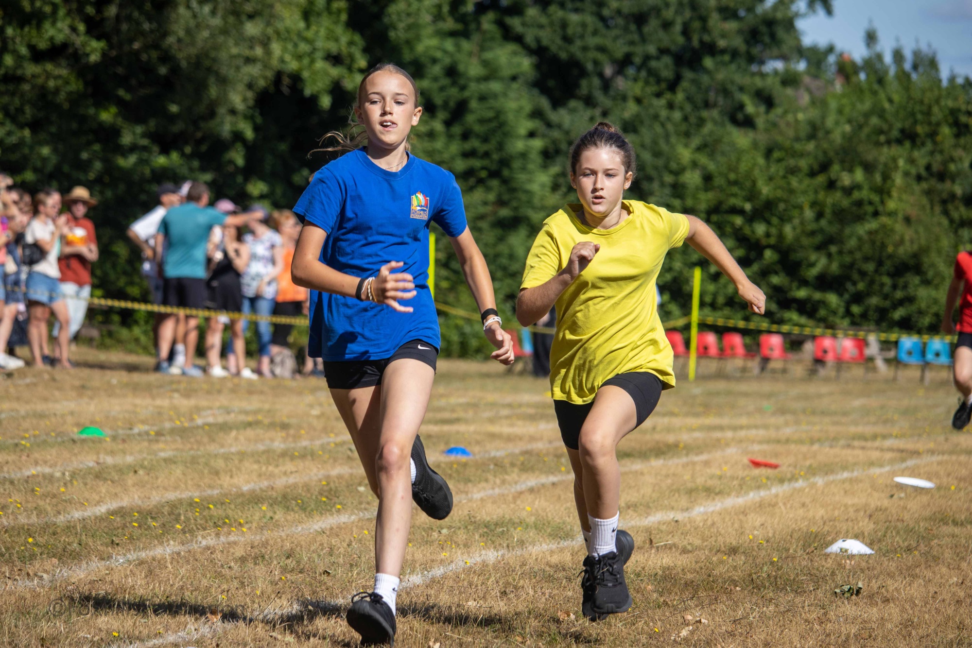 Children run a running race