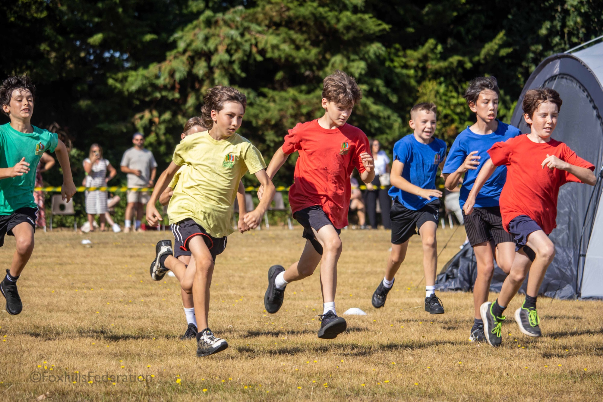 Children run a running race