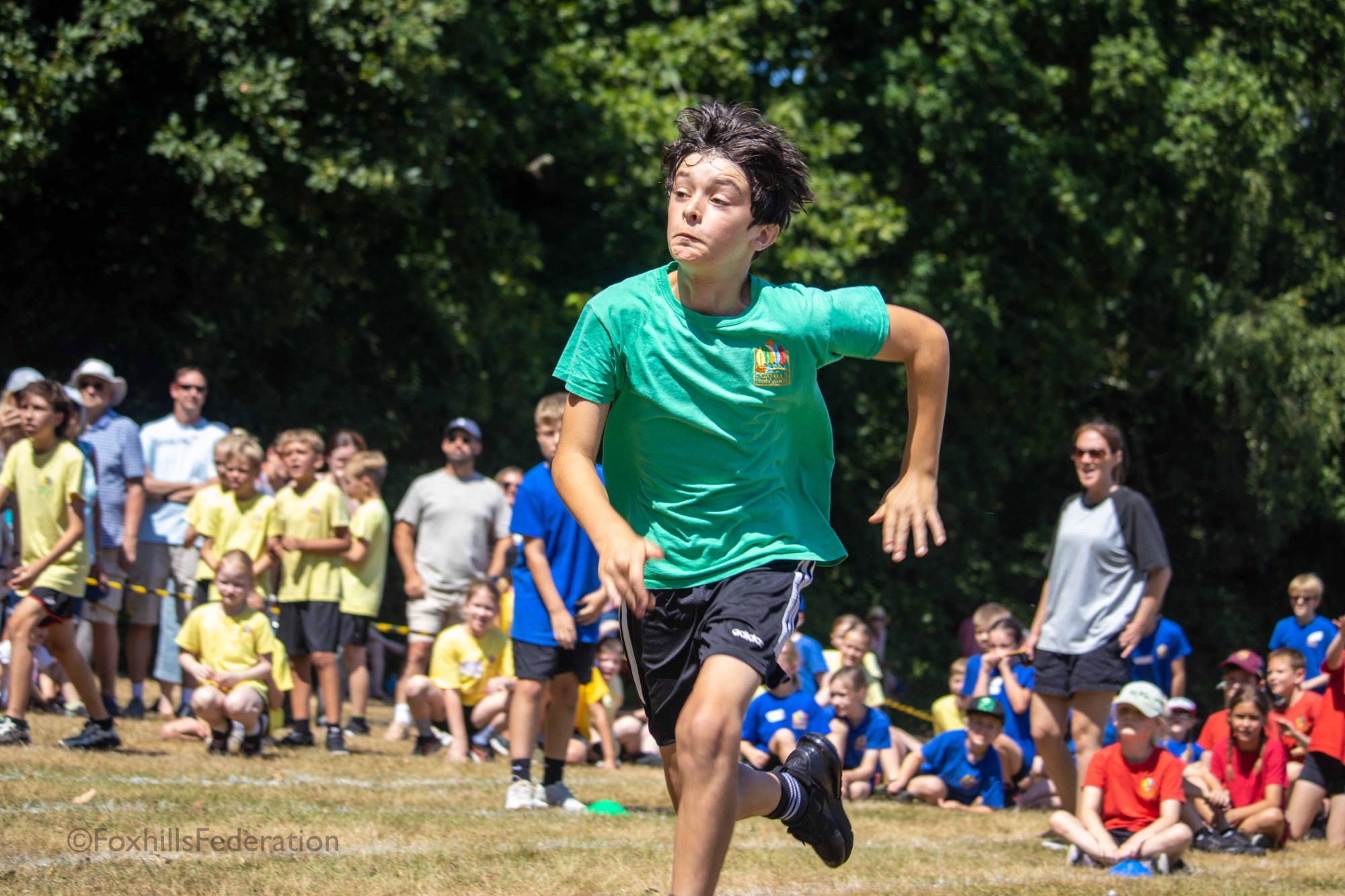 Children run a running race